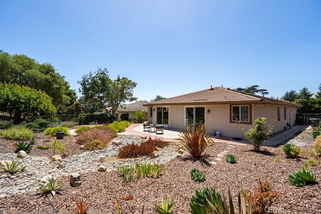 839 Chukar St, Arroyo Grande, CA 93420 - back of house featuring a patio area and stucco siding