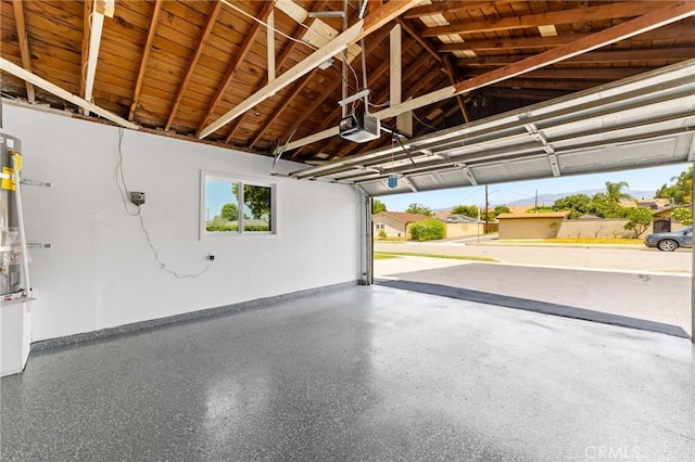 4883 Harvard St, Montclair, CA 91763 - garage with a garage door opener