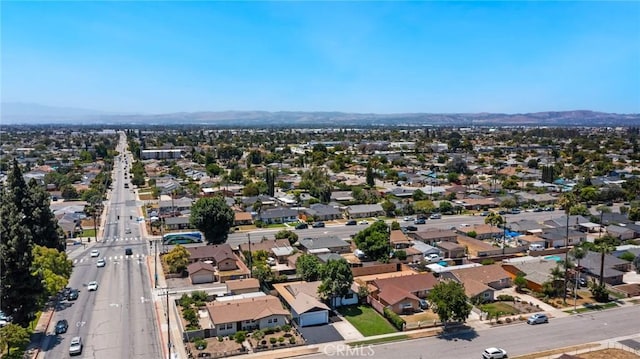 4883 Harvard St, Montclair, CA 91763 - aerial view of residential area featuring a mountainous background