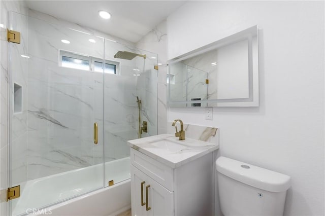 4883 Harvard St, Montclair, CA 91763 - full bathroom featuring vanity, shower / bath combination with glass door, and recessed lighting