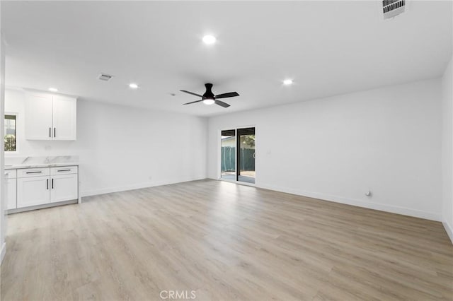4883 Harvard St, Montclair, CA 91763 - unfurnished living room featuring recessed lighting, a ceiling fan, and light wood-style floors