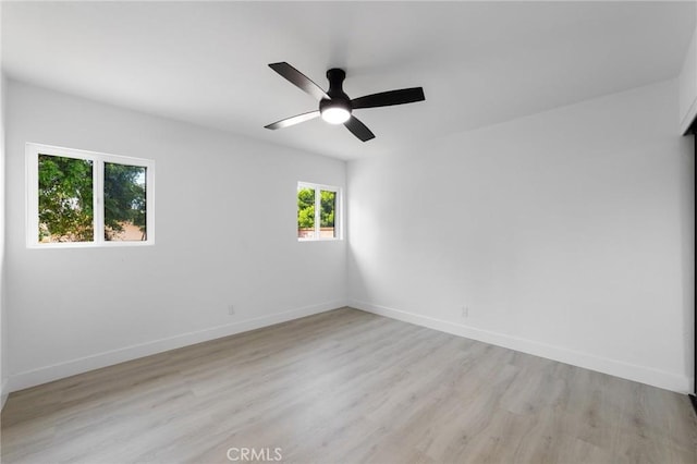 4883 Harvard St, Montclair, CA 91763 - empty room with light wood finished floors and ceiling fan