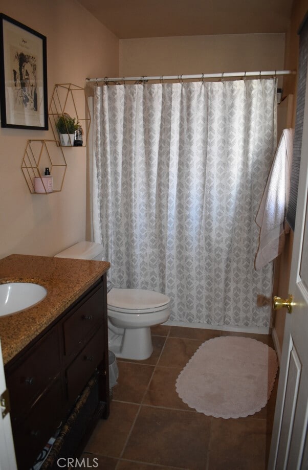 356 S S St, Rialto, CA 92376 - full bath featuring vanity, tile patterned floors, and a shower with curtain