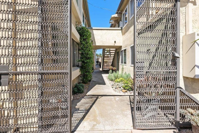 4525 Mississippi St Unit 2, San Diego, CA 92116 - view of property exterior featuring stairway and stucco siding
