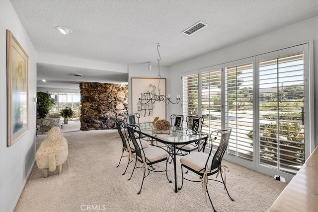 54832 Benecia Trl, Yucca Valley, CA 92284 - dining space with carpet flooring and a textured ceiling