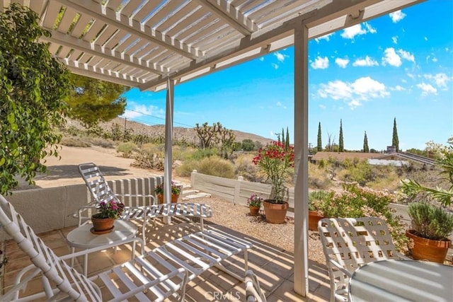 54832 Benecia Trl, Yucca Valley, CA 92284 - view of patio / terrace with a pergola and a mountain view