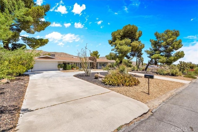 54832 Benecia Trl, Yucca Valley, CA 92284 - single story home with driveway and a garage
