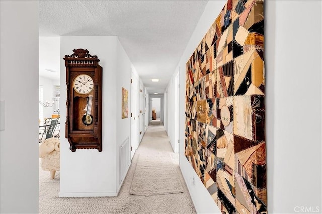 54832 Benecia Trl, Yucca Valley, CA 92284 - hallway with light colored carpet and a textured ceiling