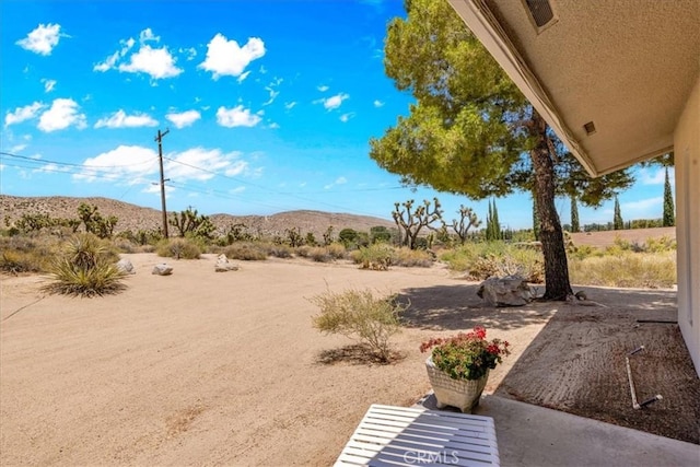 54832 Benecia Trl, Yucca Valley, CA 92284 - view of yard with a mountain view