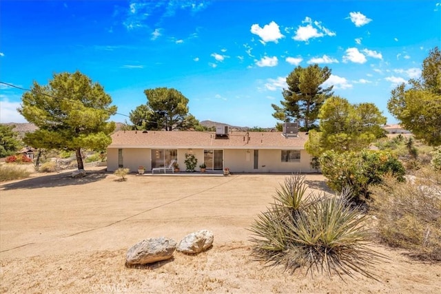 54832 Benecia Trl, Yucca Valley, CA 92284 - rear view of property with stucco siding