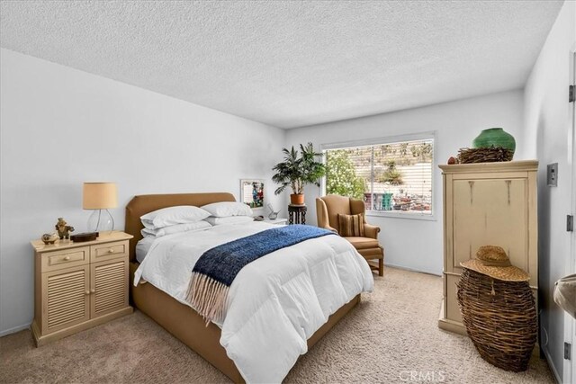 54832 Benecia Trl, Yucca Valley, CA 92284 - bedroom featuring carpet flooring and a textured ceiling