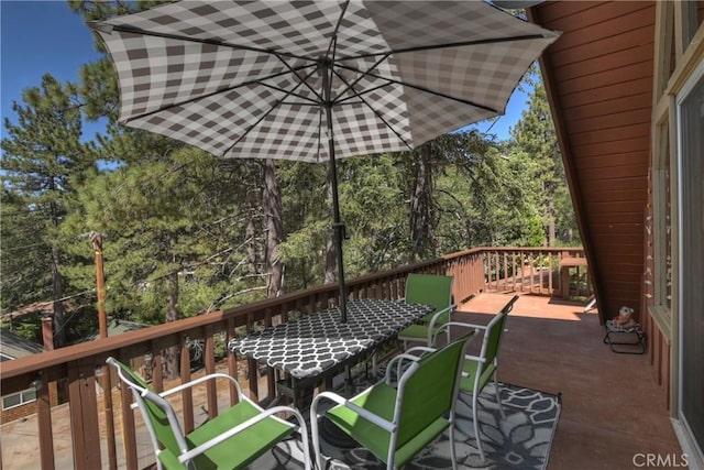 33480 Weeping Willow Dr, Green Valley Lake, CA 92341 - wooden deck featuring outdoor dining area and view of scattered trees