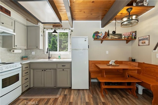 33480 Weeping Willow Dr, Green Valley Lake, CA 92341 - kitchen featuring white appliances, gray cabinets, dark wood finished floors, light countertops, and under cabinet range hood