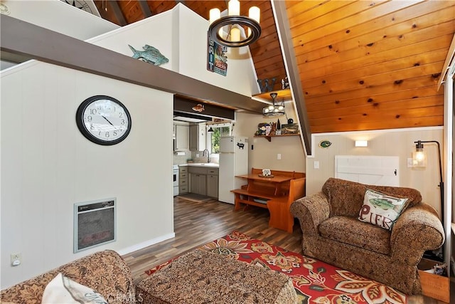 33480 Weeping Willow Dr, Green Valley Lake, CA 92341 - living area with dark wood finished floors, high vaulted ceiling, beam ceiling, and wooden walls