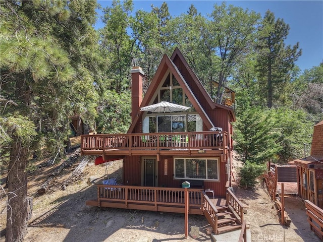 33480 Weeping Willow Dr, Green Valley Lake, CA 92341 - back of house with a wooden deck and a chimney