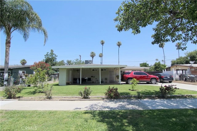 5631 Walter St, Riverside, CA 92504 - view of front facade featuring a front yard and concrete driveway