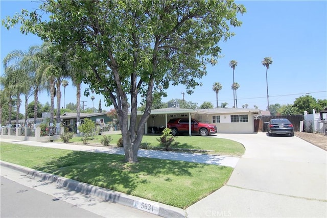 5631 Walter St, Riverside, CA 92504 - ranch-style home with driveway and a carport