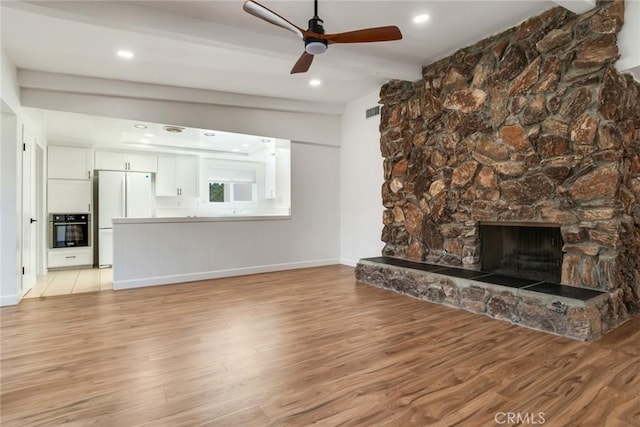 2343 Navarro Dr, Claremont, CA 91711 - unfurnished living room featuring light wood finished floors, beam ceiling, ceiling fan, a fireplace, and recessed lighting