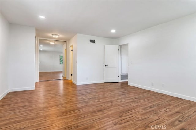 2343 Navarro Dr, Claremont, CA 91711 - empty room with wood finished floors and recessed lighting