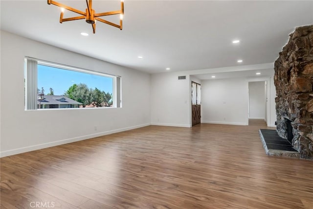 2343 Navarro Dr, Claremont, CA 91711 - unfurnished living room with a chandelier, recessed lighting, and wood finished floors