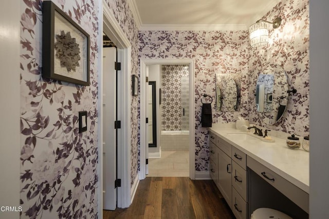 111 S Orange Grove Blvd Unit 203, Pasadena, CA 91105 - bathroom with ornamental molding, wallpapered walls, wood finished floors, and vanity
