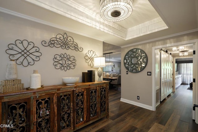 111 S Orange Grove Blvd Unit 203, Pasadena, CA 91105 - corridor featuring crown molding, a tray ceiling, dark wood-style flooring, and a chandelier
