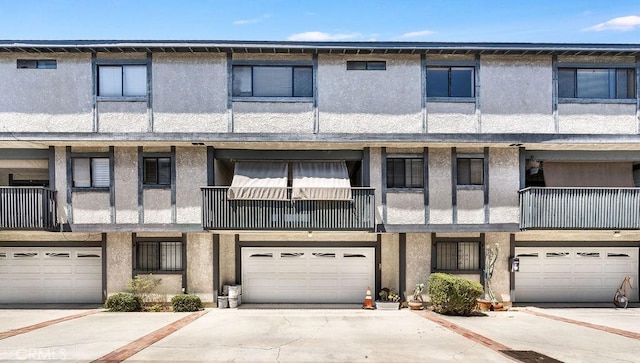 14927 Condon Ave Unit 7, Lawndale, CA 90260 - view of property with an attached garage and driveway