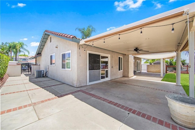 8761 Sandhill Dr, Riverside, CA 92508 - back of house with ceiling fan, a gate, stucco siding, and a patio area