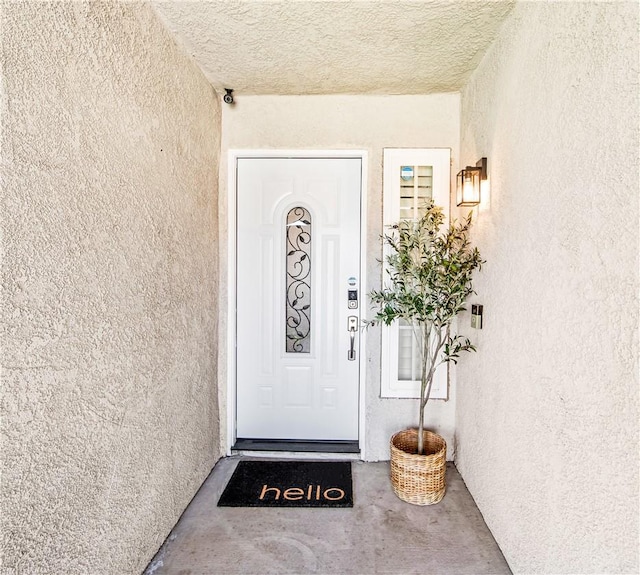 8761 Sandhill Dr, Riverside, CA 92508 - view of exterior entry featuring stucco siding