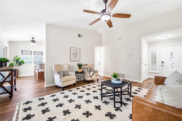 8761 Sandhill Dr, Riverside, CA 92508 - living room featuring ceiling fan, wood finished floors, and vaulted ceiling