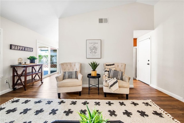 8761 Sandhill Dr, Riverside, CA 92508 - living area featuring wood finished floors and high vaulted ceiling