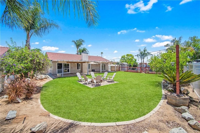 8761 Sandhill Dr, Riverside, CA 92508 - fenced backyard with a patio
