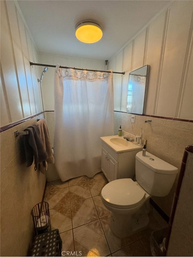 9167 Citrus Ave, Fontana, CA 92335 - full bathroom featuring vanity, tile walls, tile patterned flooring, and decorative backsplash