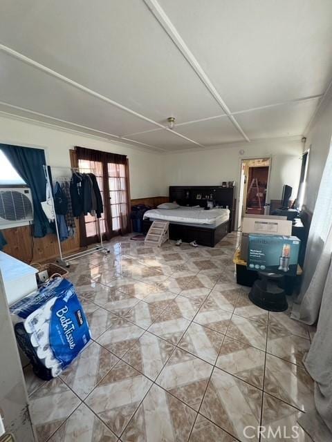 9167 Citrus Ave, Fontana, CA 92335 - bedroom featuring multiple windows, cooling unit, and french doors