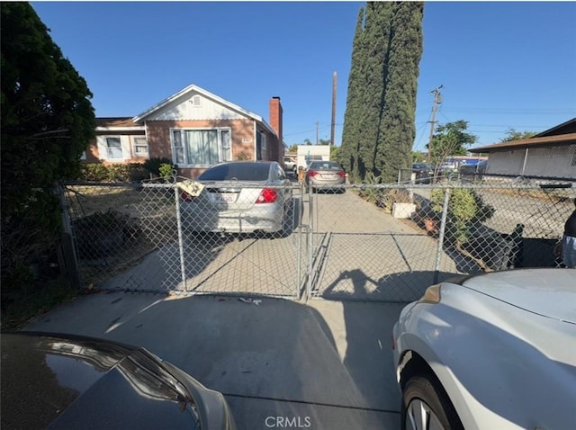 9167 Citrus Ave, Fontana, CA 92335 - view of front of property featuring a gate
