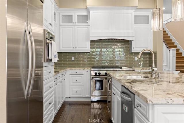 17472 Oakbluffs Ln, Huntington Beach, CA 92649 - kitchen featuring stainless steel appliances, custom range hood, and white cabinets