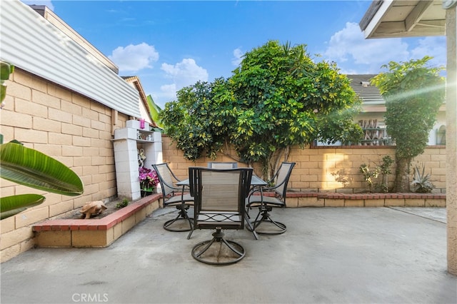3718 Berkshire Rd, Pico Rivera, CA 90660 - fenced backyard featuring a patio and outdoor dining area