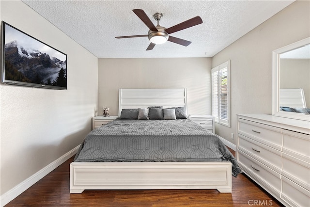 3718 Berkshire Rd, Pico Rivera, CA 90660 - bedroom with a textured ceiling, dark wood finished floors, and a ceiling fan