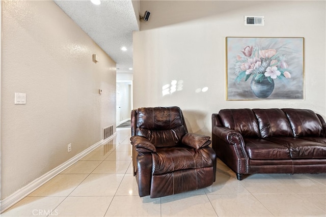 3718 Berkshire Rd, Pico Rivera, CA 90660 - living room with light tile patterned floors and recessed lighting
