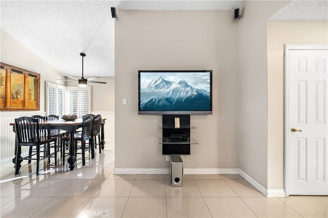 3718 Berkshire Rd, Pico Rivera, CA 90660 - dining space featuring a textured ceiling, tile patterned floors, ceiling fan, and lofted ceiling