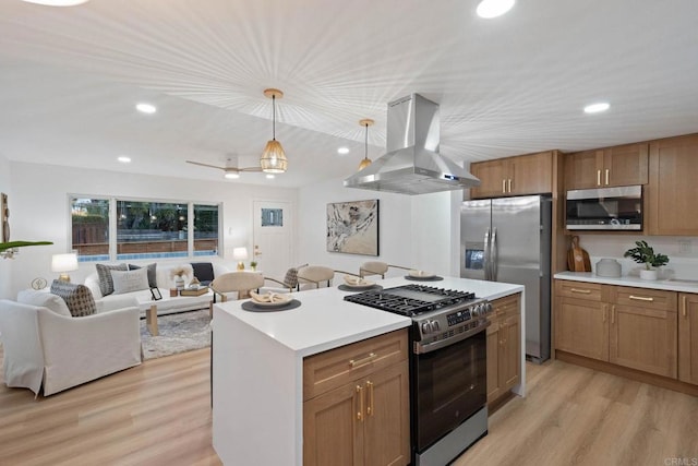 709 Puebla St, Encinitas, CA 92024 - kitchen featuring island range hood, stainless steel appliances, light wood-type flooring, light countertops, and recessed lighting