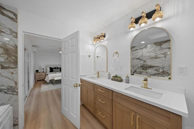 709 Puebla St, Encinitas, CA 92024 - ensuite bathroom with wood finished floors, double vanity, and a ceiling fan