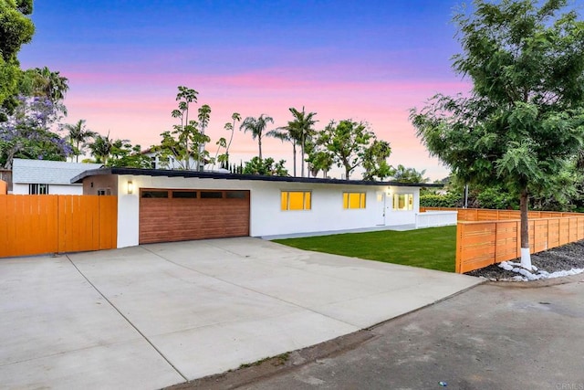 709 Puebla St, Encinitas, CA 92024 - view of front of property featuring a garage, concrete driveway, and stucco siding