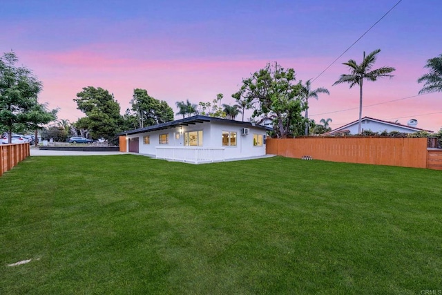 709 Puebla St, Encinitas, CA 92024 - back of property at dusk with a garage and driveway