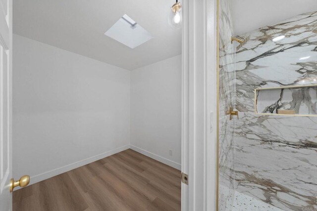 709 Puebla St, Encinitas, CA 92024 - interior space with a skylight and wood finished floors