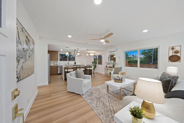 709 Puebla St, Encinitas, CA 92024 - living area with an AC wall unit, recessed lighting, light wood-type flooring, and ceiling fan
