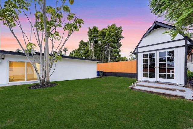 709 Puebla St, Encinitas, CA 92024 - yard at dusk featuring french doors