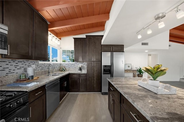 15352 Pastrana Dr, La Mirada, CA 90638 - kitchen with appliances with stainless steel finishes, wood ceiling, light stone countertops, decorative backsplash, and dark brown cabinetry