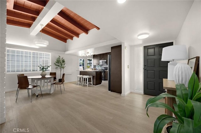 15352 Pastrana Dr, La Mirada, CA 90638 - dining space with light wood finished floors and wooden ceiling