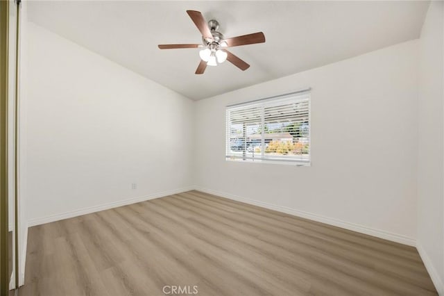 15352 Pastrana Dr, La Mirada, CA 90638 - spare room with light wood-style flooring, a ceiling fan, and vaulted ceiling